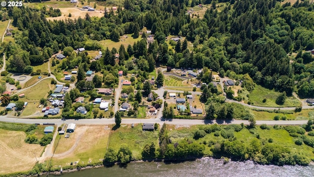 91456 State Rd, Coquille, OR 97423 - aerial overview of property's location with a heavily wooded area