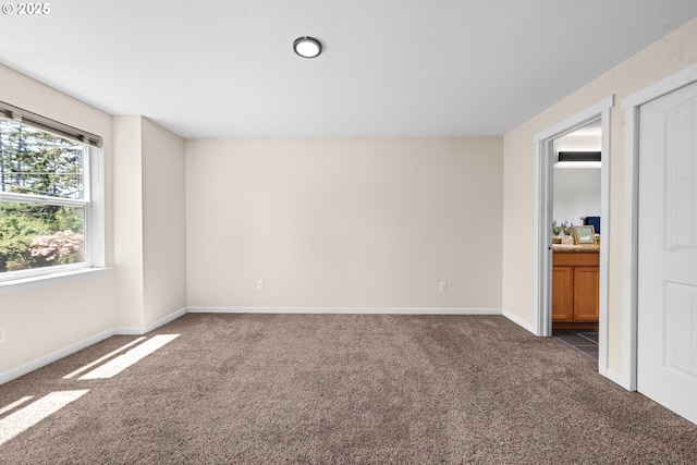 1225 3rd Ave, Hammond, OR 97121 - empty room with carpet flooring and baseboards