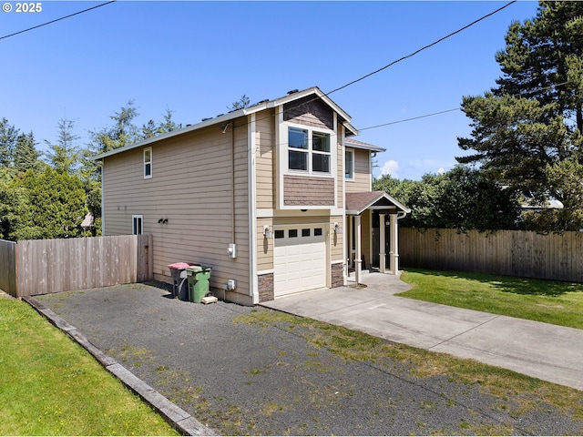 1225 3rd Ave, Hammond, OR 97121 - view of side of property featuring driveway and a garage