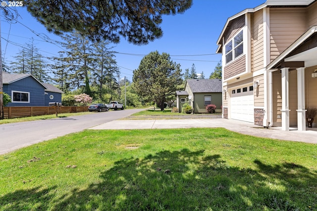 1225 3rd Ave, Hammond, OR 97121 - view of yard with driveway and a garage