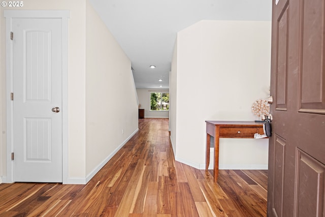 1225 3rd Ave, Hammond, OR 97121 - corridor with hardwood / wood-style floors, baseboards, and recessed lighting