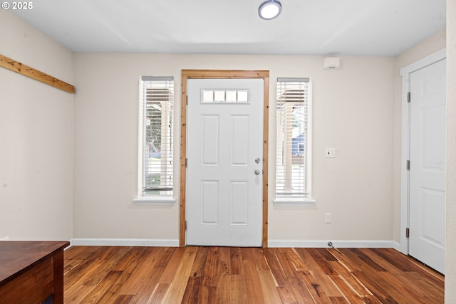1225 3rd Ave, Hammond, OR 97121 - foyer entrance with wood finished floors and baseboards