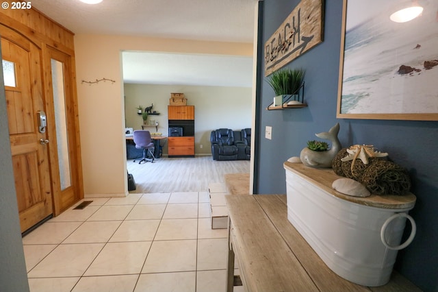 interior space with tile patterned floors