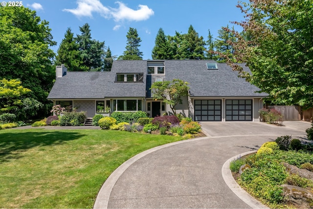 12643 S Iron Mountain Blvd, Portland, OR 97219 - view of front of home featuring a chimney, an attached garage, asphalt driveway, and a shingled roof