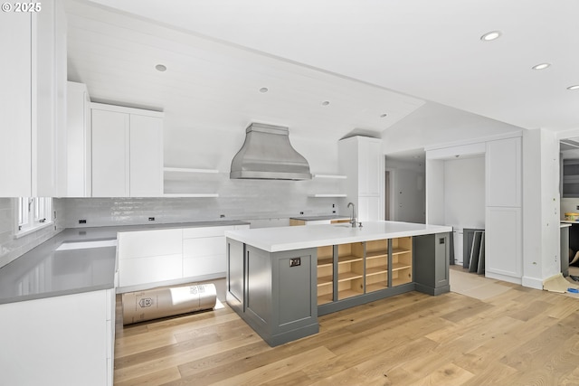 12643 S Iron Mountain Blvd, Portland, OR 97219 - kitchen featuring open shelves, recessed lighting, white cabinets, custom exhaust hood, and a sink