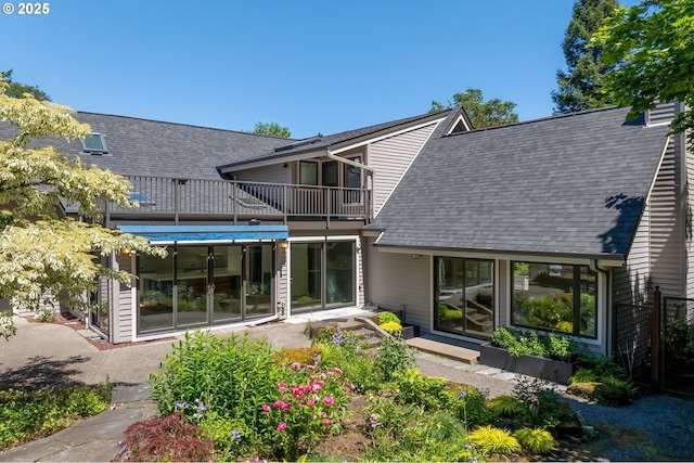 12643 S Iron Mountain Blvd, Portland, OR 97219 - back of house featuring a balcony and roof with shingles
