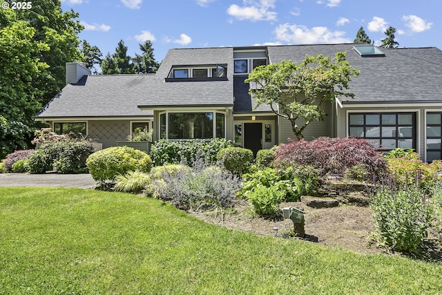 12643 S Iron Mountain Blvd, Portland, OR 97219 - view of front of property featuring a front yard, a shingled roof, and a chimney