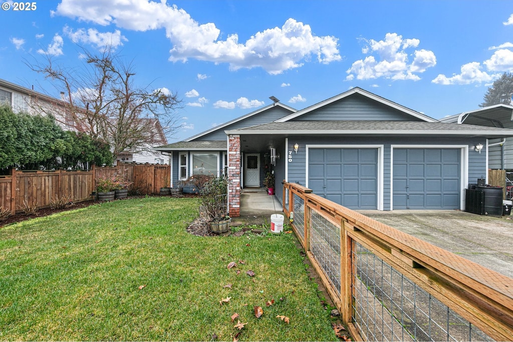 single story home featuring a front lawn and a garage