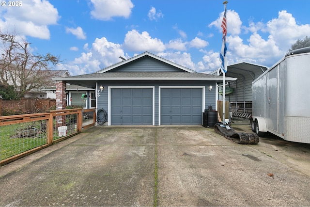 garage featuring a carport