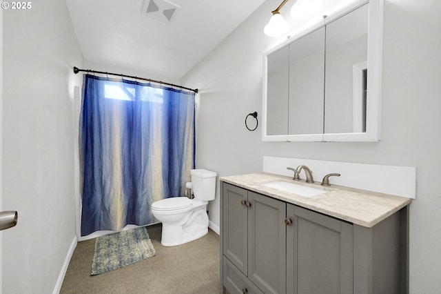 bathroom featuring vanity, toilet, and a shower with shower curtain