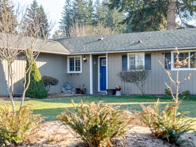 ranch-style home with a front yard