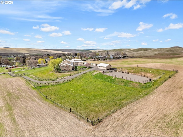 birds eye view of property featuring a rural view and a mountain view
