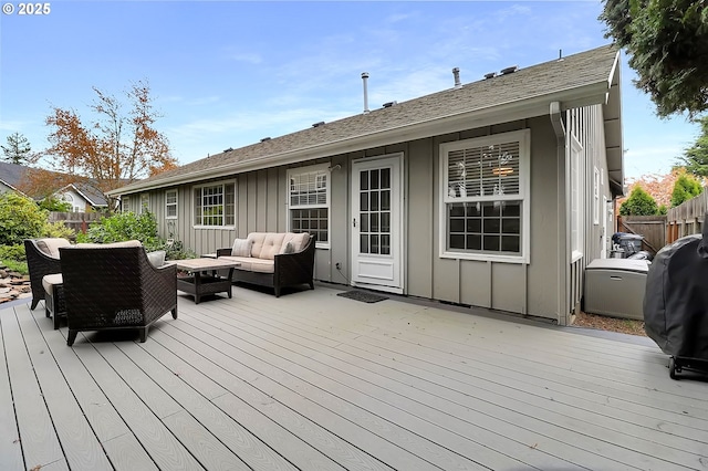 deck with fence and an outdoor hangout area