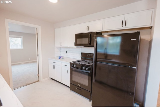 2797 Tulip St, Eugene, OR 97408 - kitchen featuring black appliances, white cabinets, light countertops, and tasteful backsplash