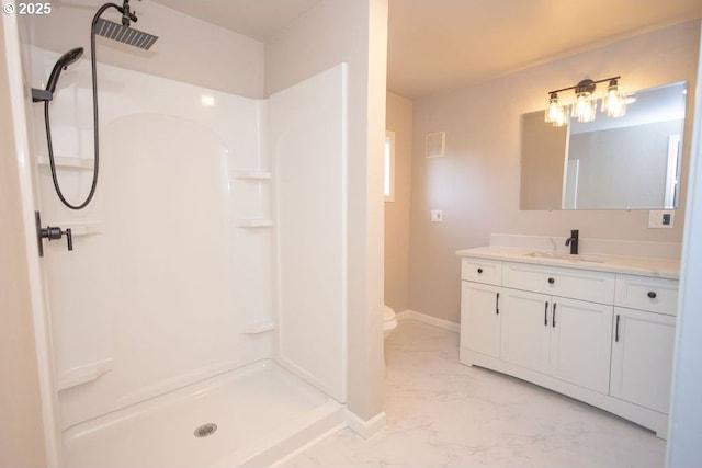 full bathroom featuring visible vents, baseboards, walk in shower, toilet, and vanity