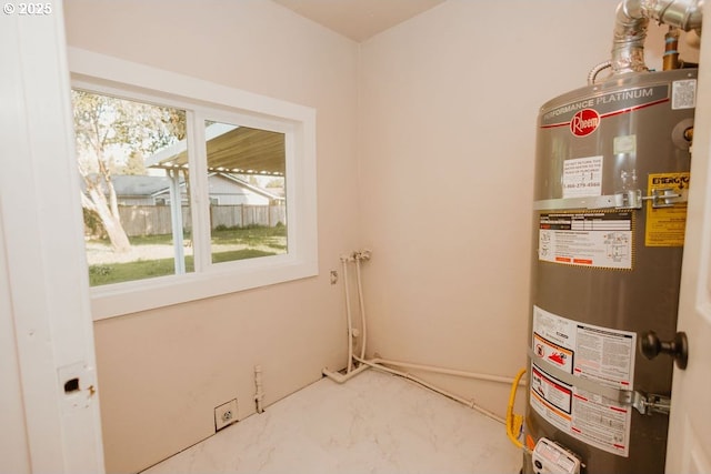 utility room with water heater