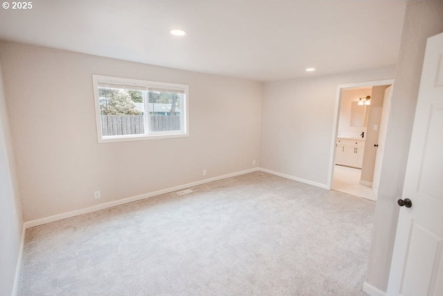 2797 Tulip St, Eugene, OR 97408 - unfurnished room featuring recessed lighting, light colored carpet, and baseboards