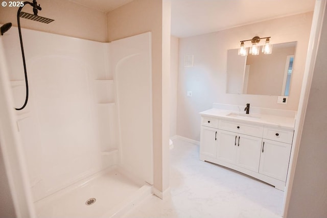 2797 Tulip St, Eugene, OR 97408 - bathroom featuring a shower, vanity, and baseboards