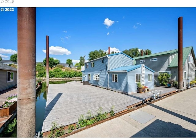 exterior space featuring a wooden deck