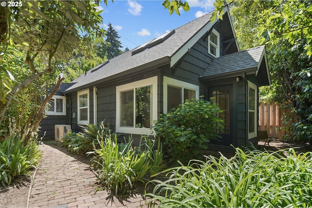 8626 SE 28th Pl, Milwaukie, OR 97222 - view of property exterior with ac unit and a shingled roof