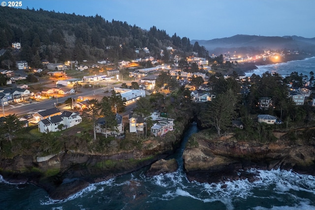 45 NW Harney St, Depoe Bay, OR 97341 - aerial overview of property's location featuring a forest and a water and mountain view