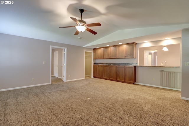 640 Sherman Dr, The Dalles, OR 97058 - unfurnished living room featuring lofted ceiling, ceiling fan, light carpet, baseboards, and recessed lighting