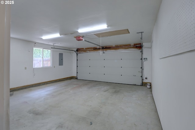 640 Sherman Dr, The Dalles, OR 97058 - garage with electric panel and a garage door opener