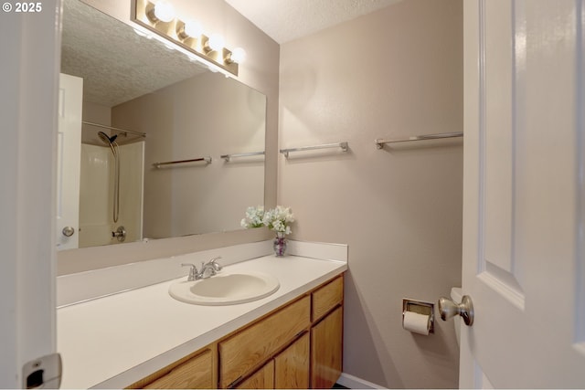 640 Sherman Dr, The Dalles, OR 97058 - bathroom with a textured ceiling and vanity