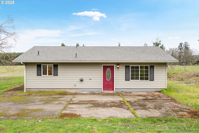 view of front of home with a shingled roof