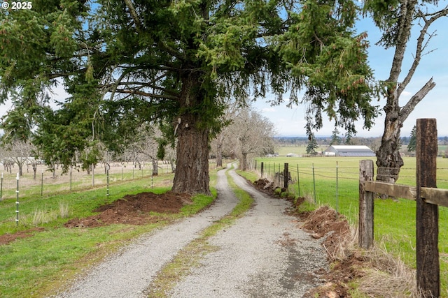 view of road featuring a rural view