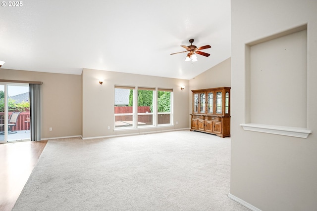 967 Whippoorwill Ct NW, Salem, OR 97304 - unfurnished living room featuring a ceiling fan, carpet flooring, and lofted ceiling