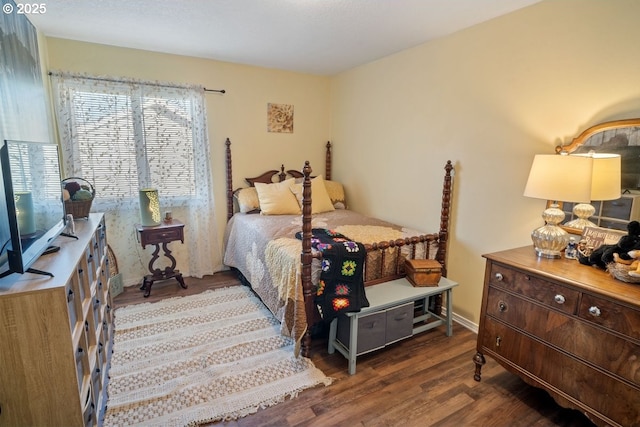 bedroom with hardwood / wood-style floors