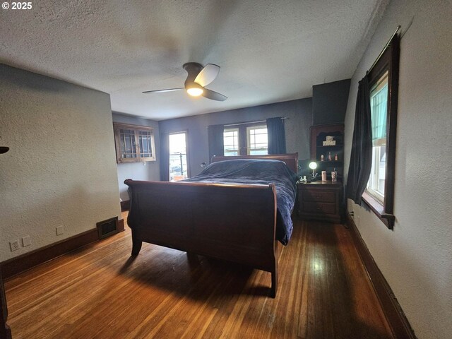 corridor with dark hardwood / wood-style flooring