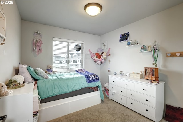 bedroom with light carpet