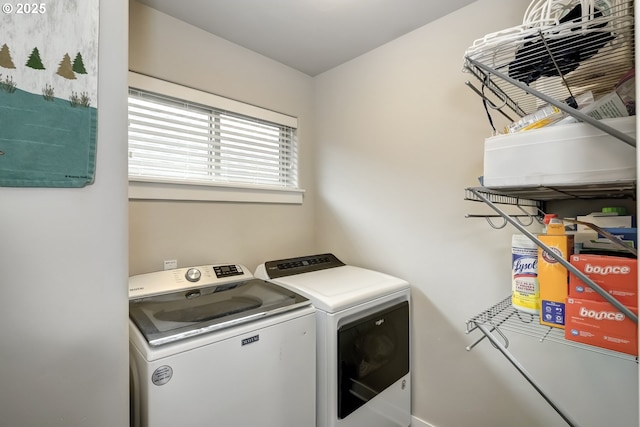 washroom with washer and clothes dryer