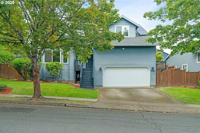 13465 SW Lancewood St, Beaverton, OR 97008 - view of front of house with a garage, driveway, stairway, and roof with shingles
