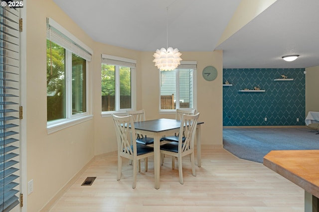13465 SW Lancewood St, Beaverton, OR 97008 - dining room with an accent wall and wood finished floors