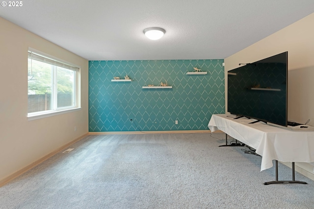 13465 SW Lancewood St, Beaverton, OR 97008 - unfurnished room with carpet, an accent wall, and baseboards