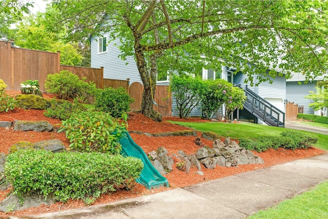 13465 SW Lancewood St, Beaverton, OR 97008 - view of yard with a playground and an attached garage