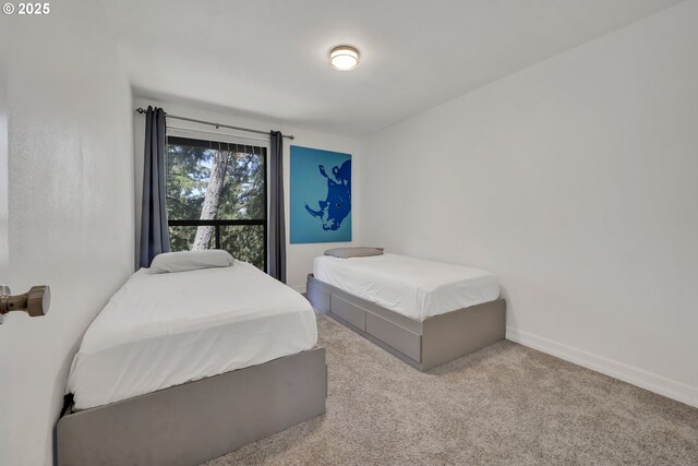 103 Treehill Loop, Eugene, OR 97405 - carpeted bedroom featuring baseboards