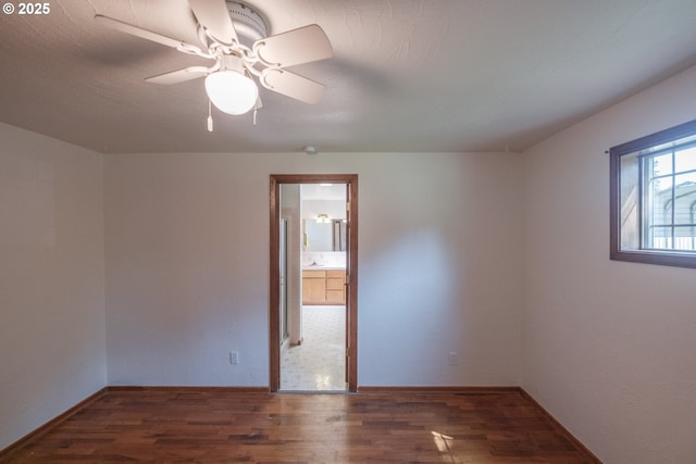 30563 Fairview Rd, Lebanon, OR 97355 - unfurnished room featuring wood finished floors, baseboards, and ceiling fan