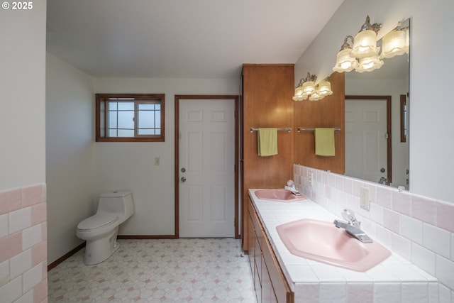 30563 Fairview Rd, Lebanon, OR 97355 - full bath with toilet, double vanity, and decorative backsplash