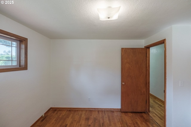 30563 Fairview Rd, Lebanon, OR 97355 - spare room with wood finished floors and baseboards