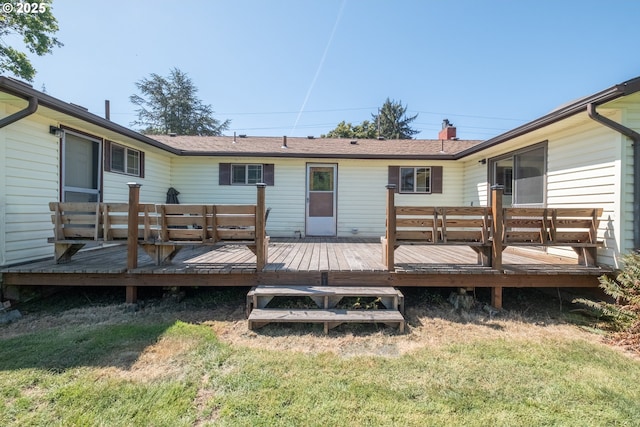30563 Fairview Rd, Lebanon, OR 97355 - rear view of property featuring a lawn and a wooden deck