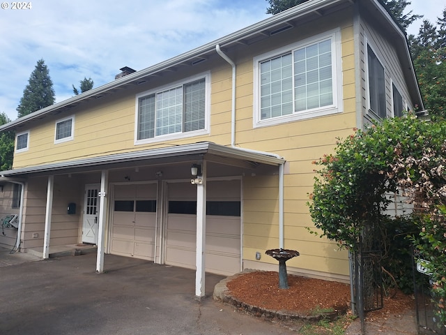 view of front of home with a garage