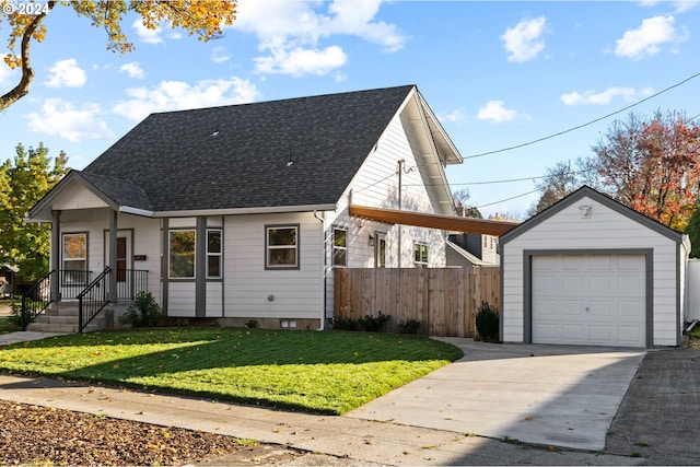 view of front facade with an outbuilding, fence, roof with shingles, concrete driveway, and a garage