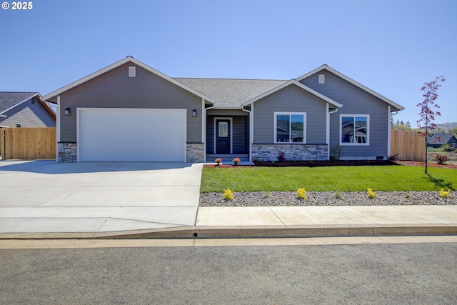 113 Citation Ct, Winston, OR 97496 - single story home with a garage, concrete driveway, and stone siding