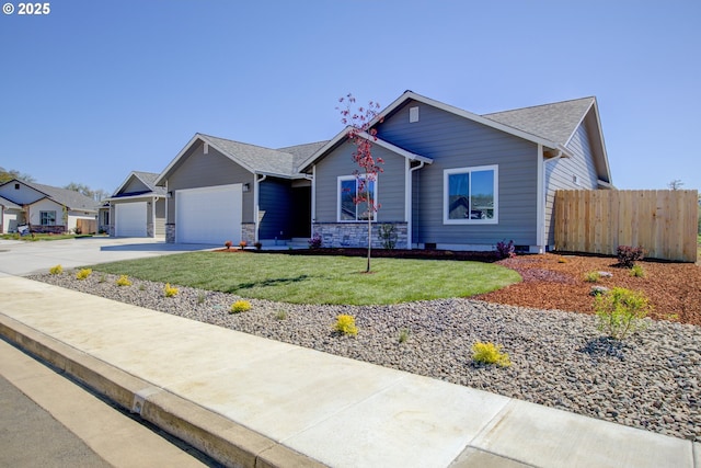 113 Citation Ct, Winston, OR 97496 - view of front of property featuring concrete driveway, a garage, and roof with shingles
