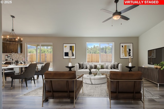 113 Citation Ct, Winston, OR 97496 - living area with a ceiling fan, a chandelier, and dark wood-type flooring