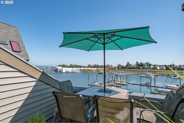 view of dock with a water view